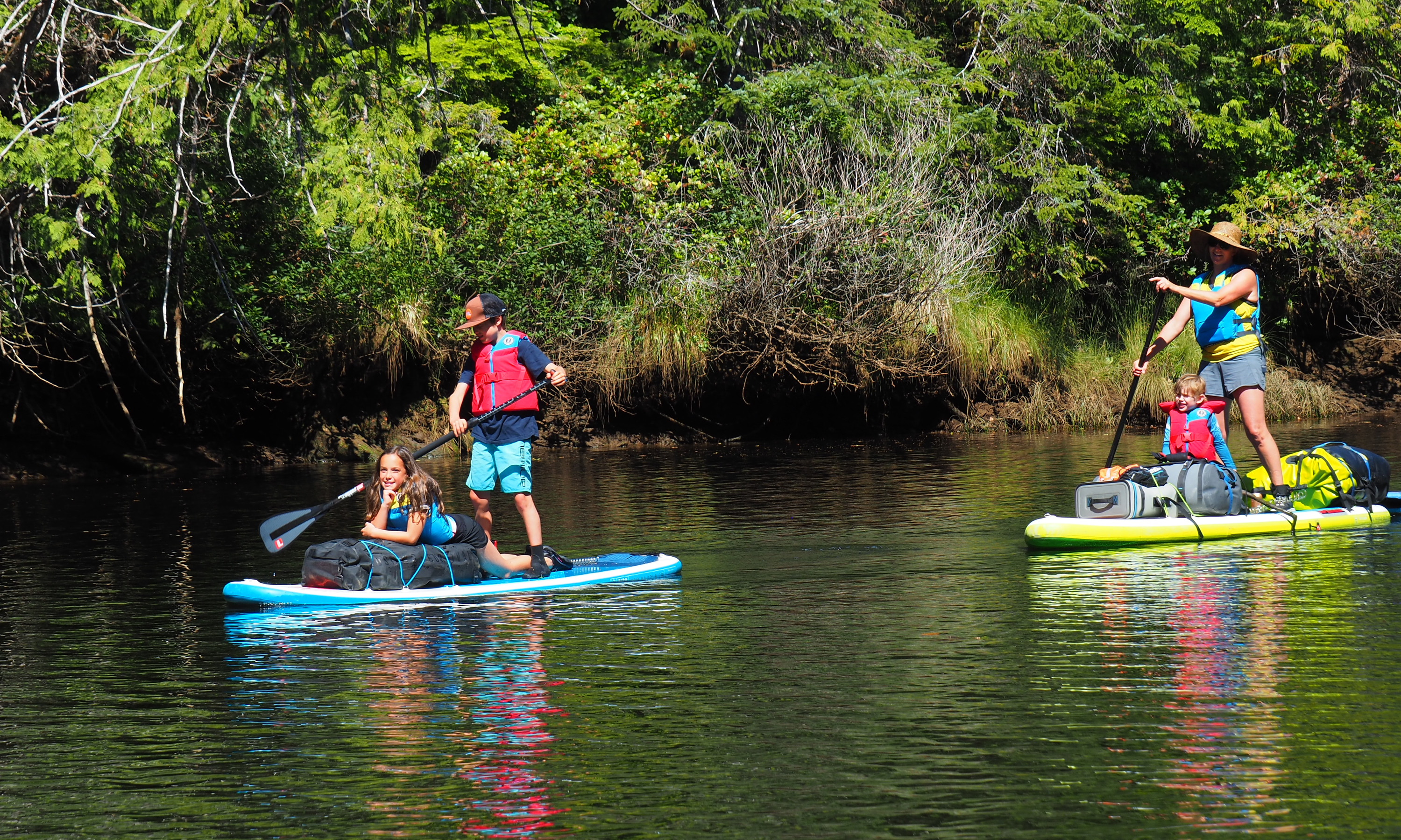 family trip with stand up paddleboards