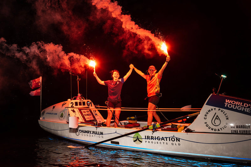Liz and Lena celebrating at the finish line of the World's Toughest Row - Pacific