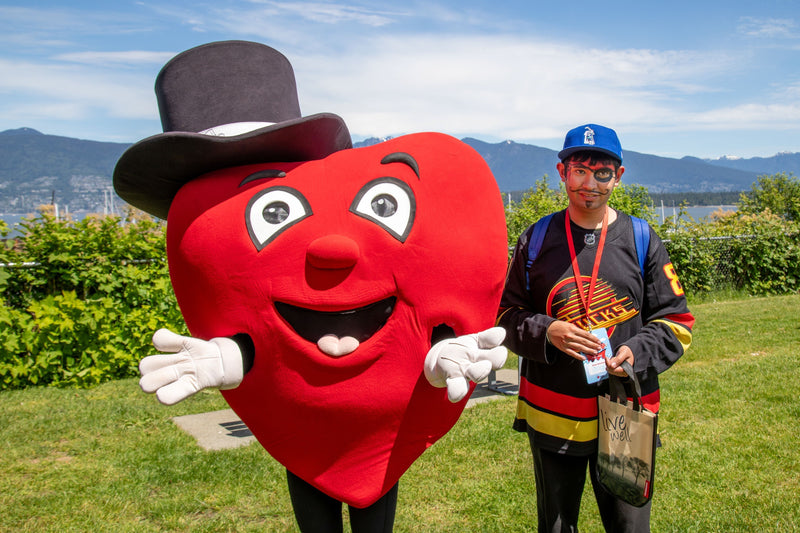 The Variety Children's Charity mascot at Treasure Island during the Boat for Hope event with one of the participants.