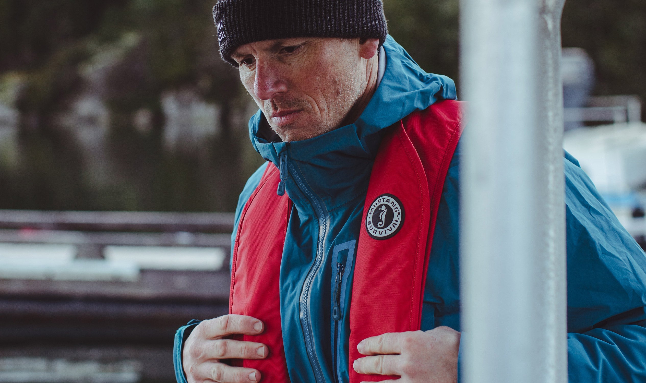 Man wearing the Mustang Survival MIT 70 inflatable PFD